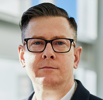 Retrato del CEO Alexander Hughes de empresa de operaciones con criptomonedas ejecutivo